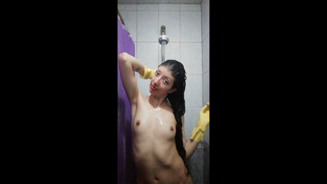 IN THE SHOWER WITH MY YELLOW RUBBER GLOVES ON