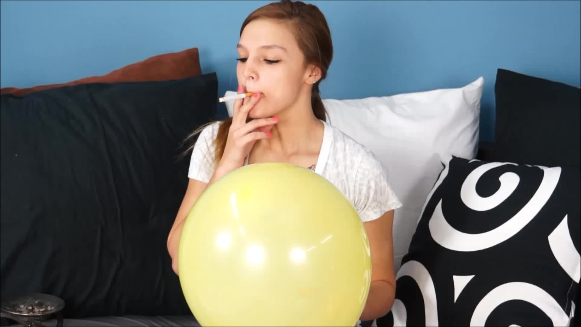 Danielle Smokes and pops Balloons