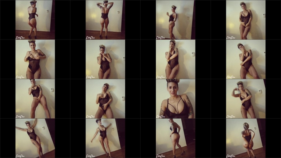 Della Dane Dancing In A Black Bodysuit