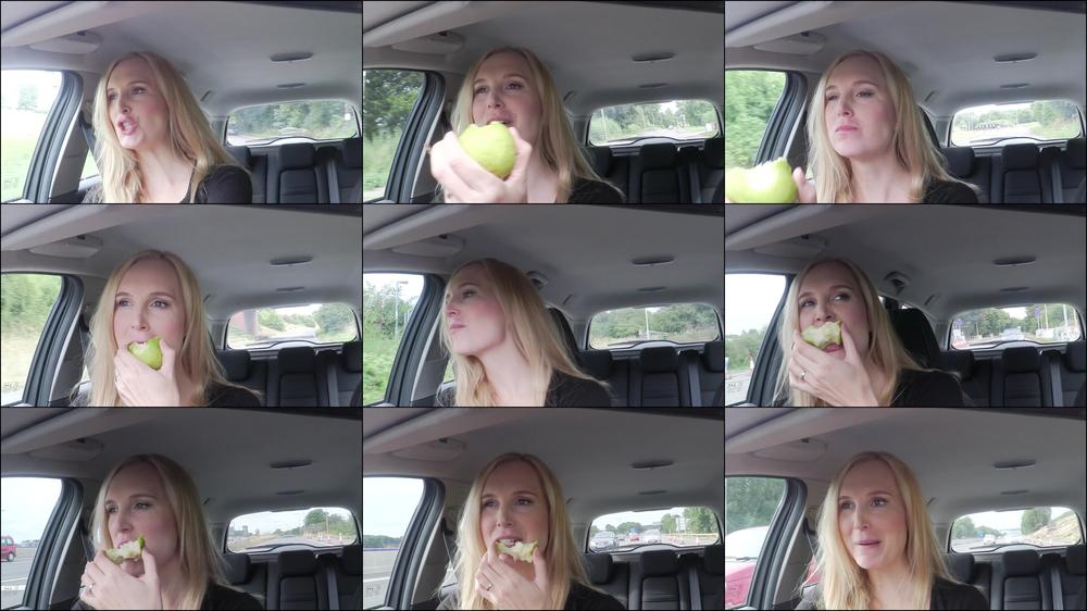 Ariel Anderssen Feasting On A Juicy Pear In The Car