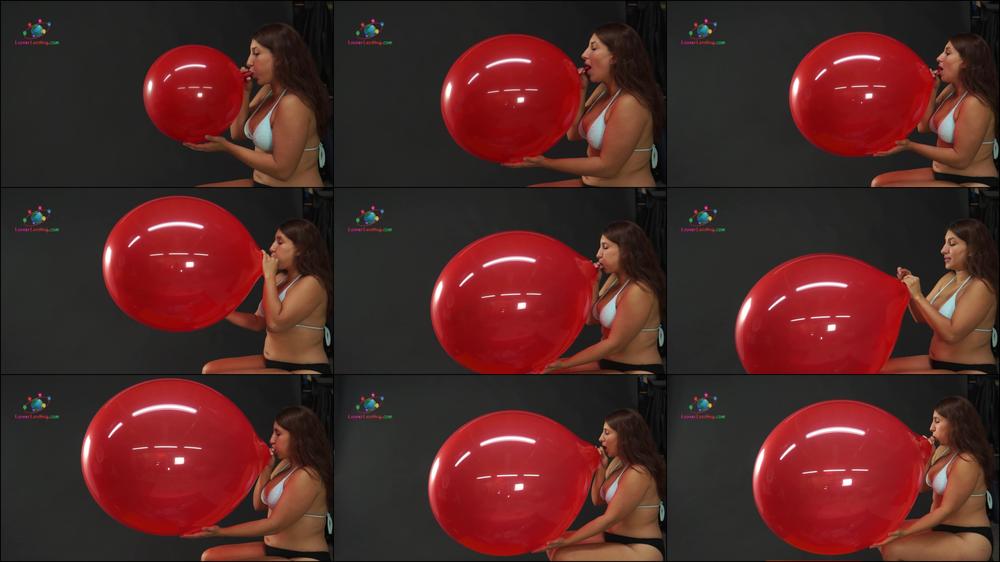 Natasha Blow Pops a 24 inch balloon