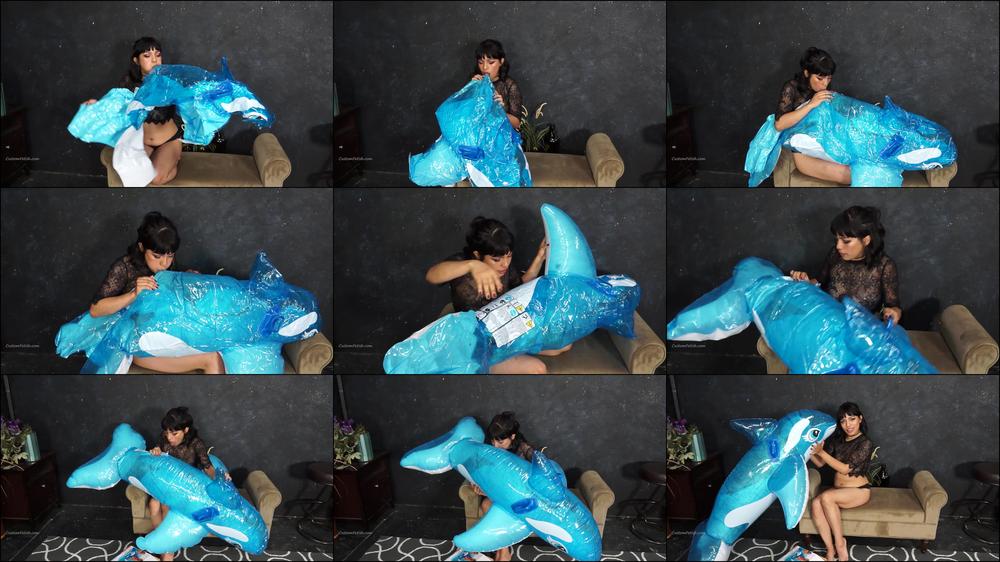 Valerie Inflates a Whale by Mouth