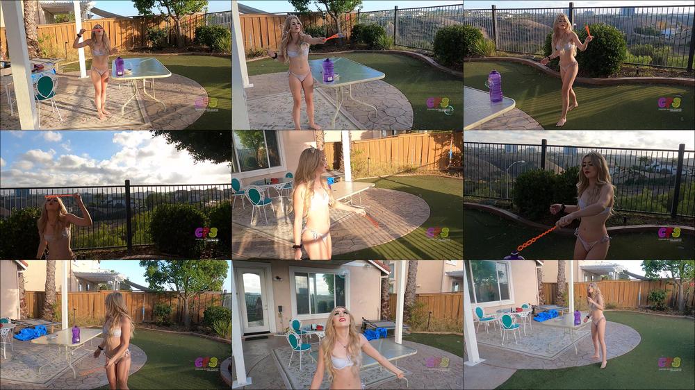 Princess A Blows Bubbles in Backyard