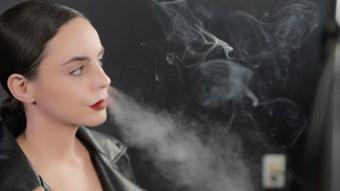 Smoking in Leather Jacket Close-Up (Dani Lynn)