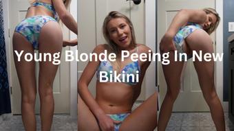 Young Blonde Peeing In New Bikini (keeks_3005)