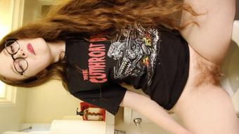 Cute Redhead in Glasses Pees In Band Tee (MadameBeatrix)