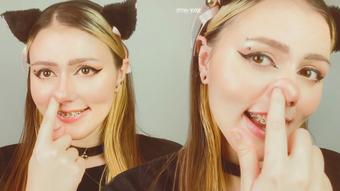 E-girl in braces is pinching her cute nose in front of you (SpookyBoogie)