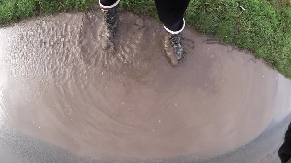 Ariel Anderssen Jumping In Puddles