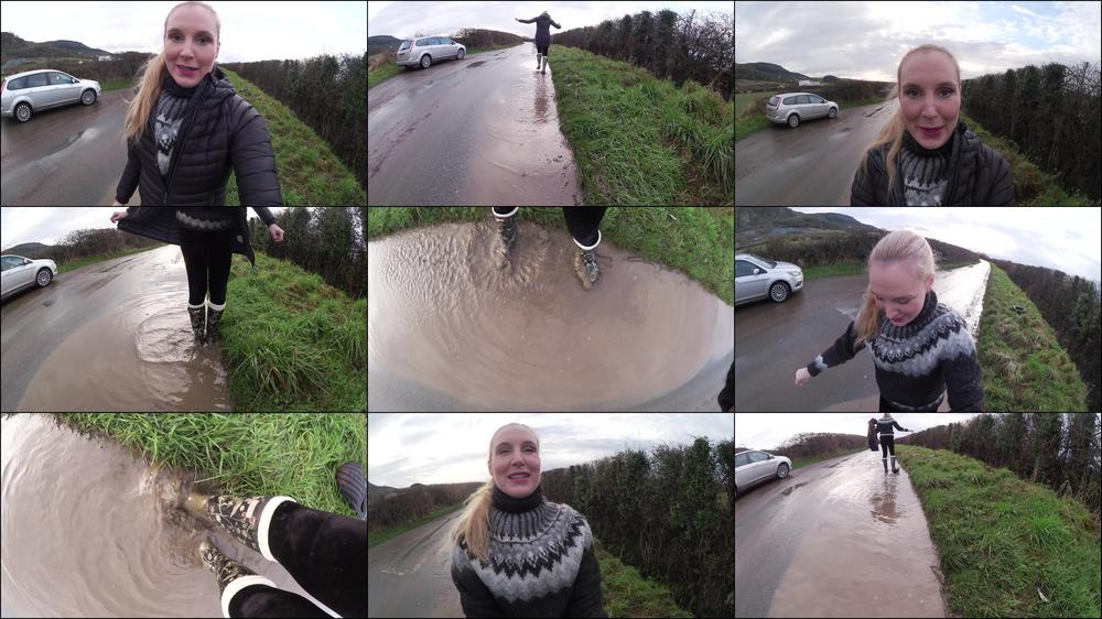 Ariel Anderssen Jumping In Puddles