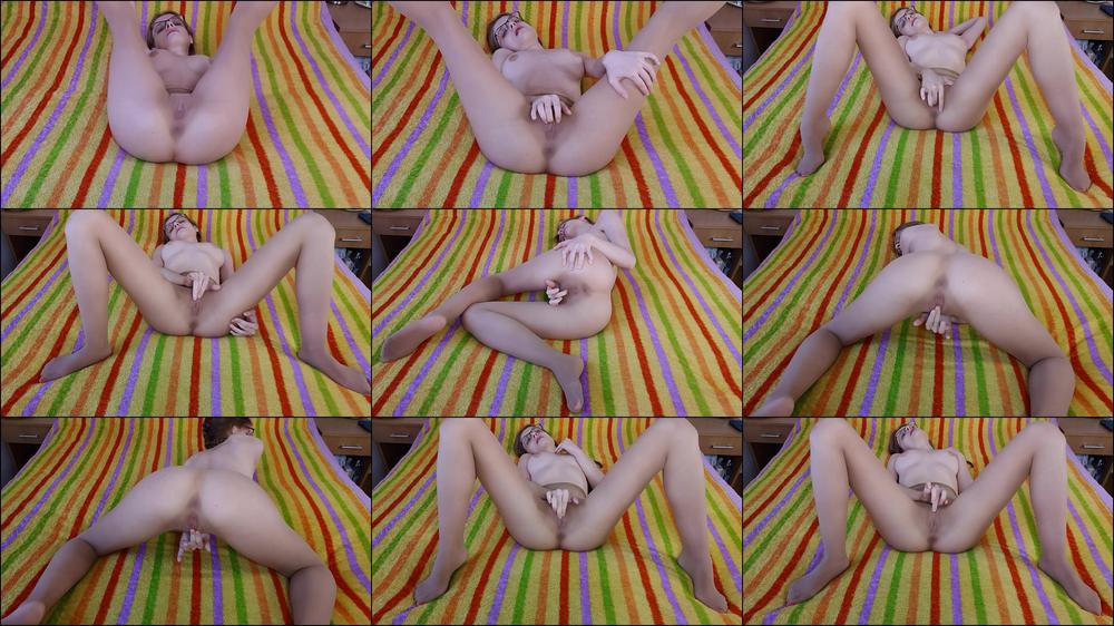 Girl rubs her pussy in nylon pantyhose