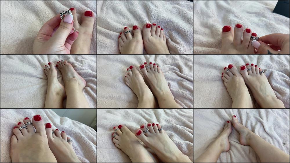 My red pedicure and toes rings