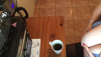 Milk in coffee - pov above (RoxanneMiller)